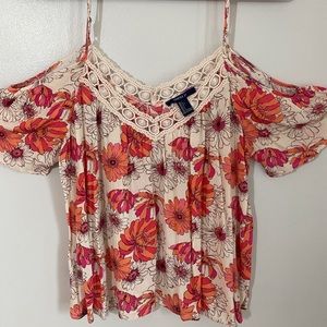 Floral strap cold shoulder floral top.